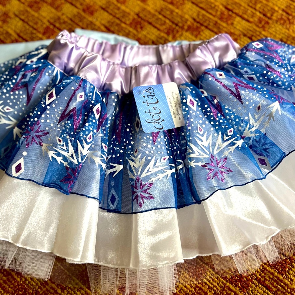 XS Dottie skirt 11 inches long. Brand new with tags